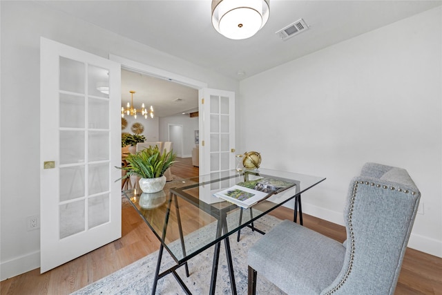 2520 Delmar Dr, Plano, TX 75075 - office with french doors, wood finished floors, and a chandelier