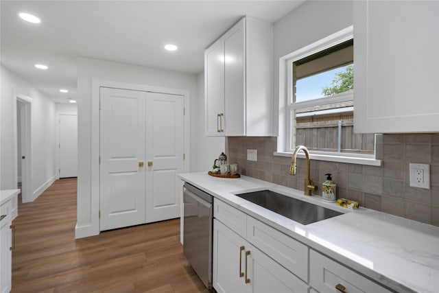 2520 Delmar Dr, Plano, TX 75075 - kitchen featuring dishwasher, white cabinetry, tasteful backsplash, wood finished floors, and recessed lighting
