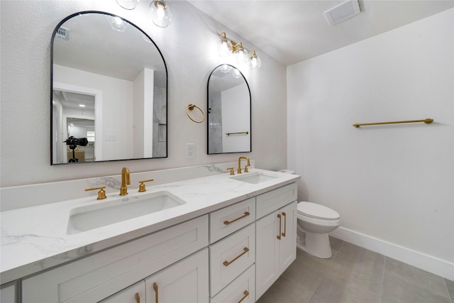 2520 Delmar Dr, Plano, TX 75075 - bathroom featuring double vanity and tile patterned flooring