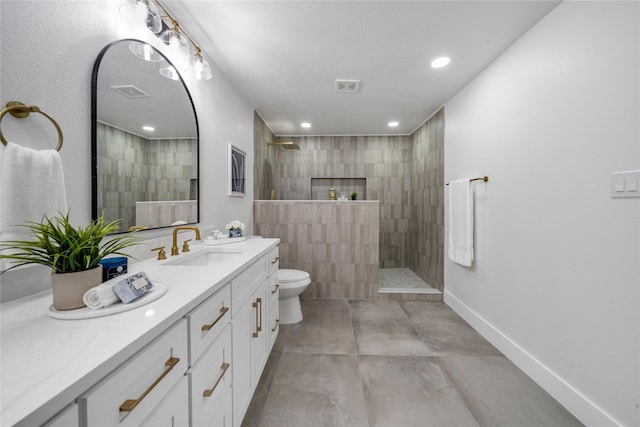 2520 Delmar Dr, Plano, TX 75075 - full bathroom featuring vanity, a walk in shower, concrete floors, and recessed lighting