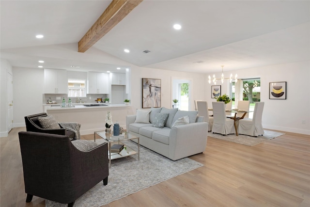2520 Delmar Dr, Plano, TX 75075 - living room with a chandelier, recessed lighting, and light wood-style floors
