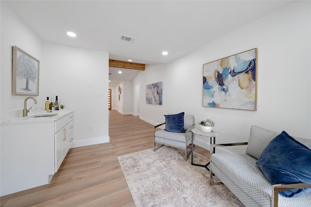 2520 Delmar Dr, Plano, TX 75075 - sitting room with recessed lighting, light wood finished floors, and stairs