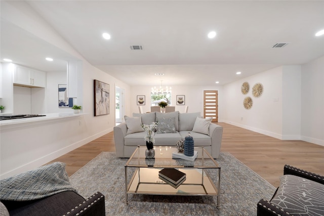 2520 Delmar Dr, Plano, TX 75075 - living area featuring a chandelier, light wood-type flooring, and recessed lighting