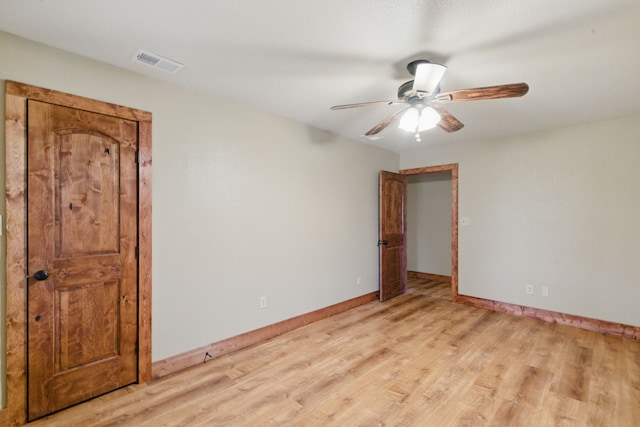 2790 Fairview Rd, Millsap, TX 76066 - unfurnished bedroom featuring light wood-style flooring, baseboards, and ceiling fan