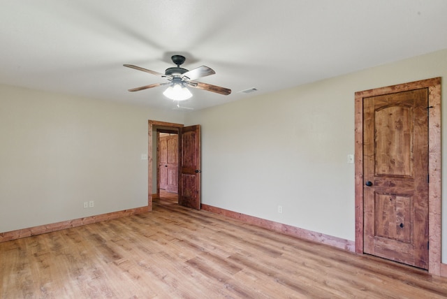 2790 Fairview Rd, Millsap, TX 76066 - spare room with light wood-style floors, a ceiling fan, and baseboards