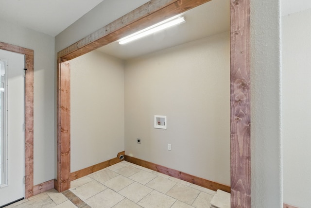 2790 Fairview Rd, Millsap, TX 76066 - washroom featuring hookup for an electric dryer, hookup for a washing machine, baseboards, and light tile patterned floors
