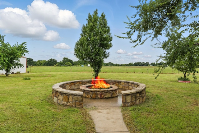 2790 Fairview Rd, Millsap, TX 76066 - view of yard featuring an outdoor fire pit and a view of countryside