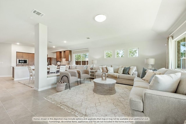 3215 Blossom Trl, Crandall, TX 75114 - living area featuring light tile patterned flooring, recessed lighting, and baseboards