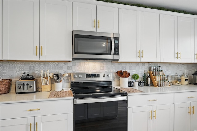1943 Applewood Trl, Forney, TX 75126 - kitchen featuring stainless steel appliances, white cabinets, light countertops, decorative backsplash, and wood finished floors