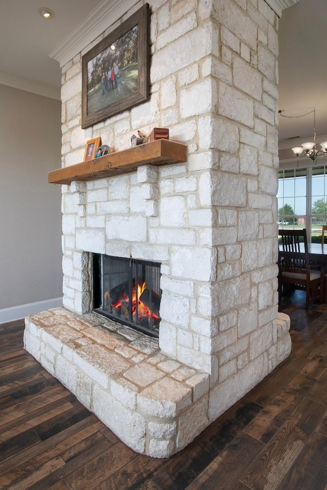 4816 Prairie Chapel Trl, Crandall, TX 75114 - detailed view of ornamental molding, a fireplace, baseboards, wood finished floors, and a chandelier