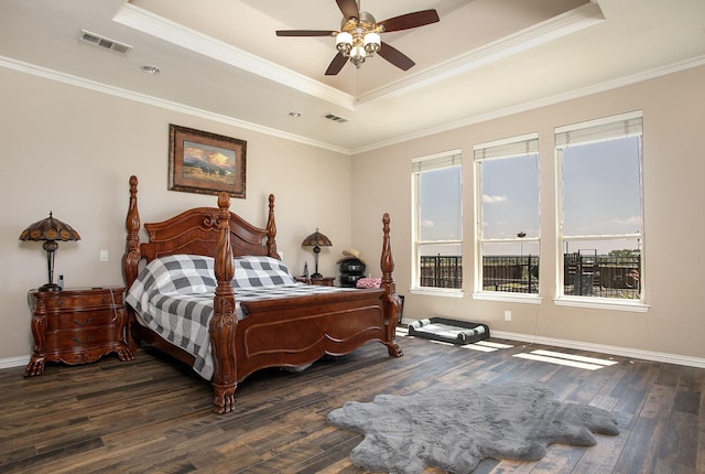4816 Prairie Chapel Trl, Crandall, TX 75114 - bedroom featuring a tray ceiling, wood finished floors, crown molding, baseboards, and a ceiling fan