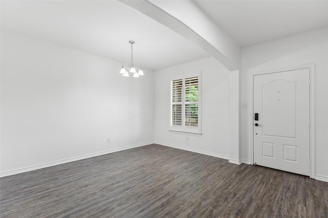 230 Sweetheart Ln, Longview, TX 75605 - entryway with dark wood-type flooring, a chandelier, and baseboards
