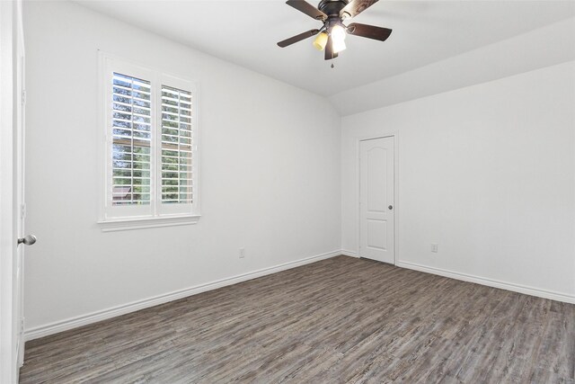 230 Sweetheart Ln, Longview, TX 75605 - unfurnished room with wood finished floors, baseboards, a ceiling fan, and vaulted ceiling