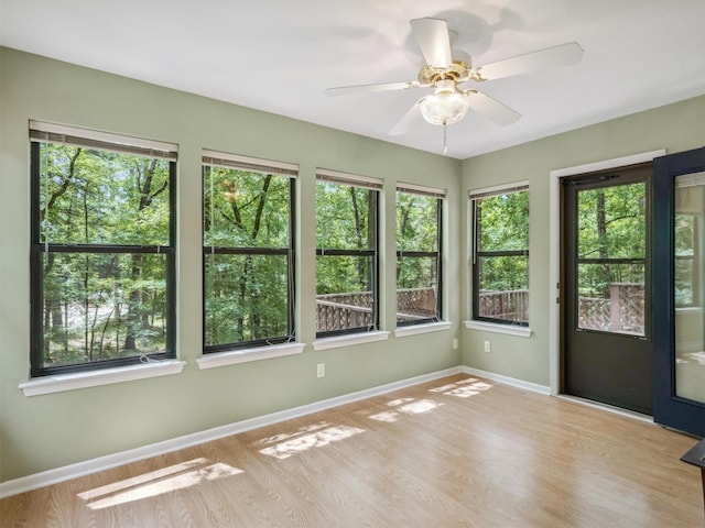 136 Lariat Loop, Holly Lake Ranch, TX 75765 - unfurnished sunroom featuring healthy amount of natural light