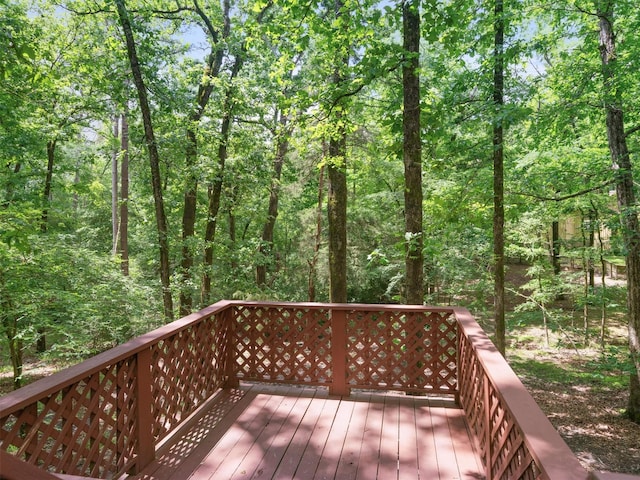 136 Lariat Loop, Holly Lake Ranch, TX 75765 - deck with a view of trees