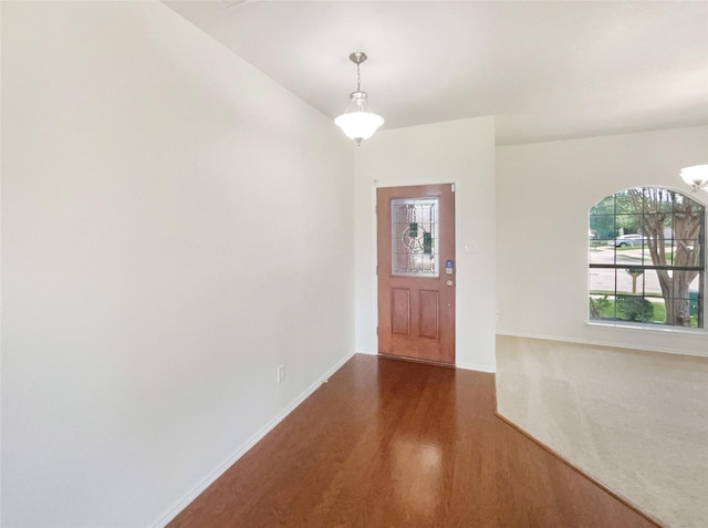 1017 Mule Deer Rd, Forney, TX 75126 - foyer entrance featuring dark wood finished floors and baseboards