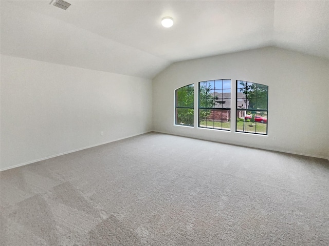 1017 Mule Deer Rd, Forney, TX 75126 - additional living space featuring vaulted ceiling, carpet, and baseboards