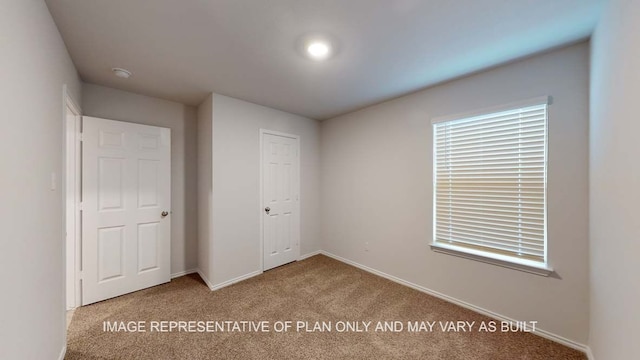 12525 Tarres Ct, Lorena, TX 76655 - unfurnished bedroom with carpet floors, baseboards, and a closet