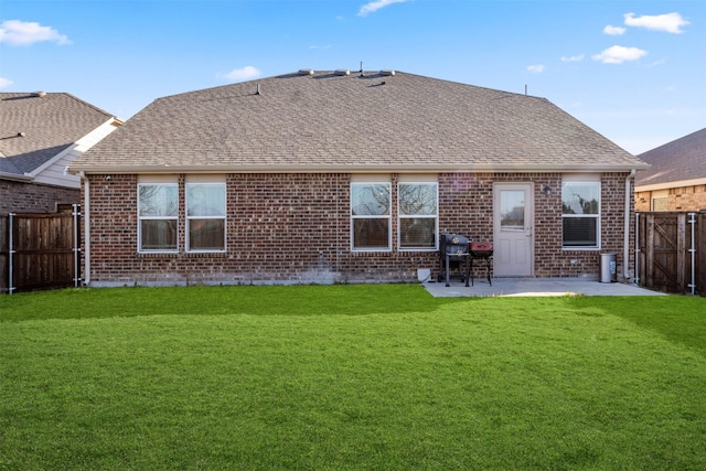 745 Brockwell Bnd, Forney, TX 75126 - back of property featuring brick siding, a patio, and a shingled roof