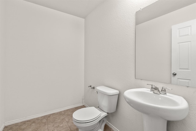 745 Brockwell Bnd, Forney, TX 75126 - bathroom with toilet, baseboards, and a sink