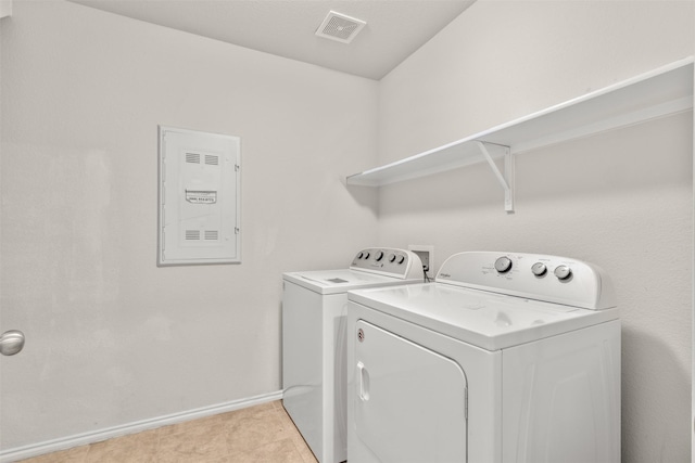 745 Brockwell Bnd, Forney, TX 75126 - laundry area with washing machine and clothes dryer, baseboards, and electric panel