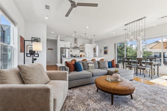 5023 Fuqua St Unit 101, Dallas, TX 75206 - living area with light wood-type flooring, ceiling fan, and recessed lighting