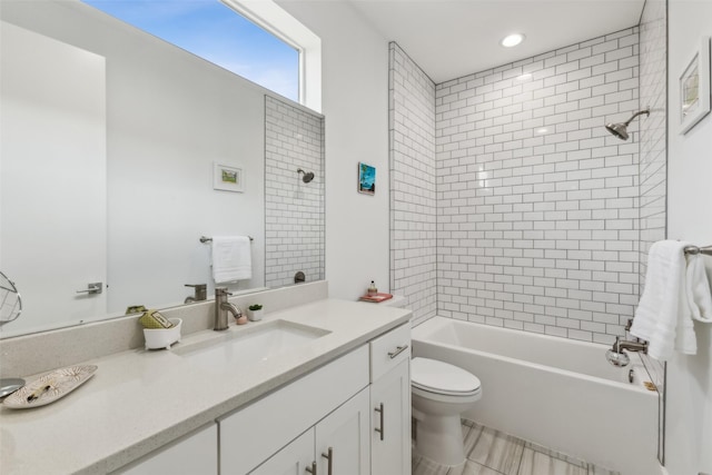 5023 Fuqua St Unit 101, Dallas, TX 75206 - bathroom featuring vanity, toilet, bathtub / shower combination, and recessed lighting