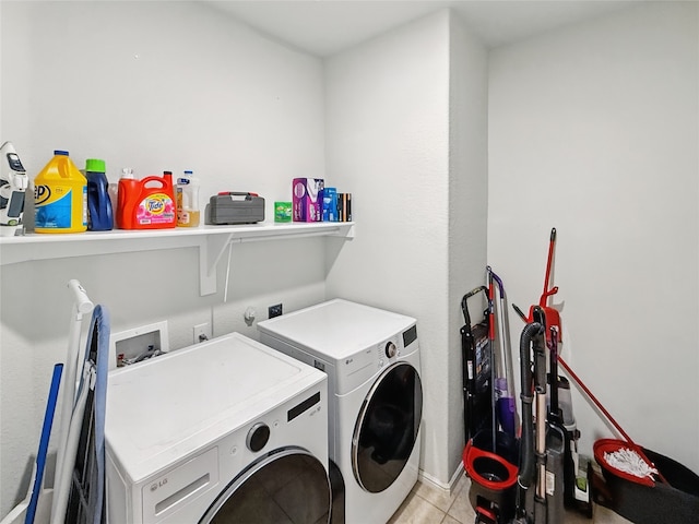 6920 Cruiser Ln, Fort Worth, TX 76179 - laundry area featuring independent washer and dryer and light tile patterned floors