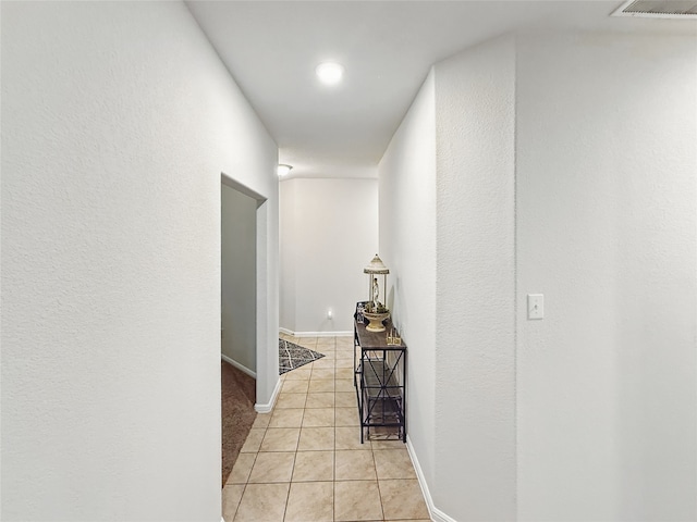 6920 Cruiser Ln, Fort Worth, TX 76179 - hall featuring light tile patterned floors and baseboards