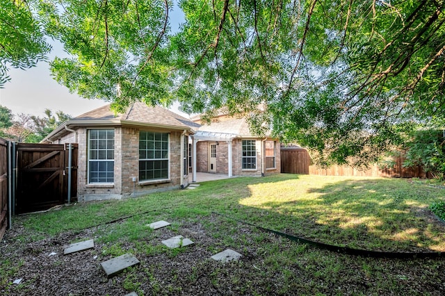 3072 Bigleaf Dr, Little Elm, TX 75068 - back of property featuring a gate, a patio area, and a pergola