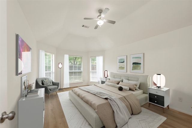 3072 Bigleaf Dr, Little Elm, TX 75068 - bedroom with light wood-style flooring, a tray ceiling, ceiling fan, and baseboards