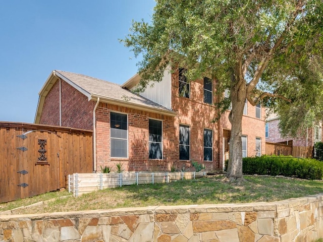 3968 Valez Dr, Carrollton, TX 75007 - view of front facade with brick siding