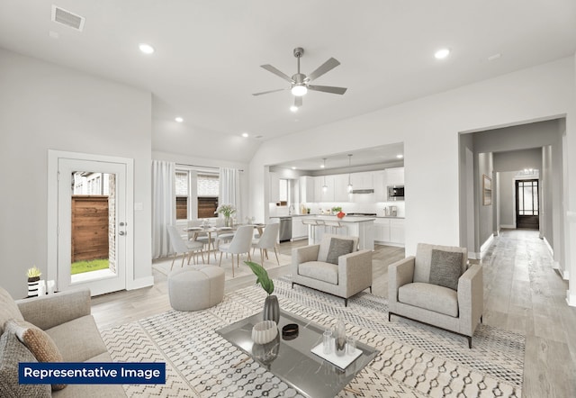 5212 Deep Creek Dr, Fort Worth, TX 76179 - living room featuring light wood finished floors, ceiling fan, recessed lighting, baseboards, and vaulted ceiling