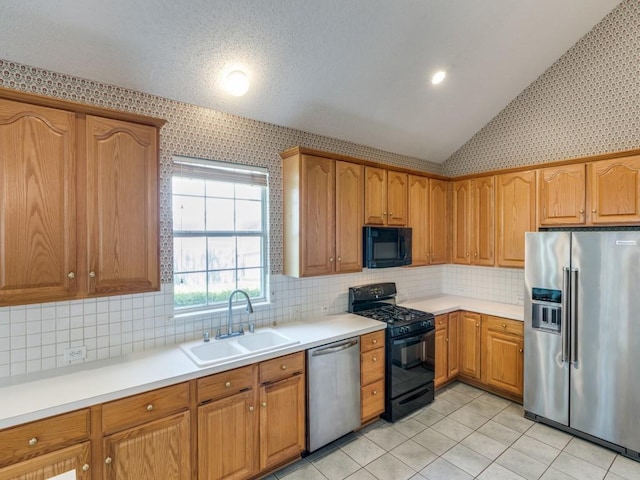 2614 Tourette Ct, Mckinney, TX 75070 - kitchen featuring black appliances, a sink, vaulted ceiling, light countertops, and backsplash