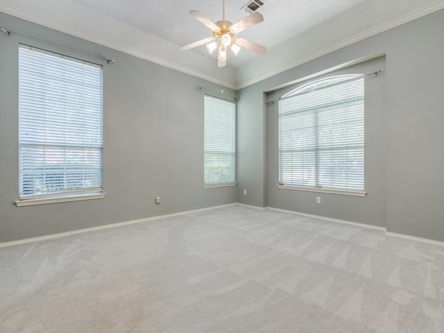 2614 Tourette Ct, Mckinney, TX 75070 - spare room with ornamental molding, light carpet, a ceiling fan, and baseboards