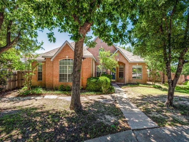 2614 Tourette Ct, Mckinney, TX 75070 - view of front facade with brick siding and roof with shingles