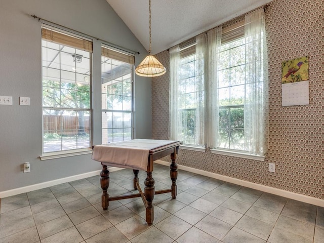 2614 Tourette Ct, Mckinney, TX 75070 - tiled dining area with baseboards, vaulted ceiling, healthy amount of natural light, and billiards table
