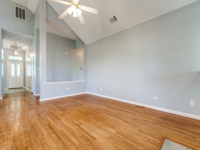 2614 Tourette Ct, Mckinney, TX 75070 - empty room with high vaulted ceiling, light wood-type flooring, baseboards, and ceiling fan