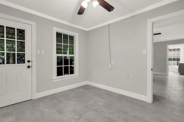 1316 Elm St, Bonham, TX 75418 - spare room featuring ceiling fan and baseboards