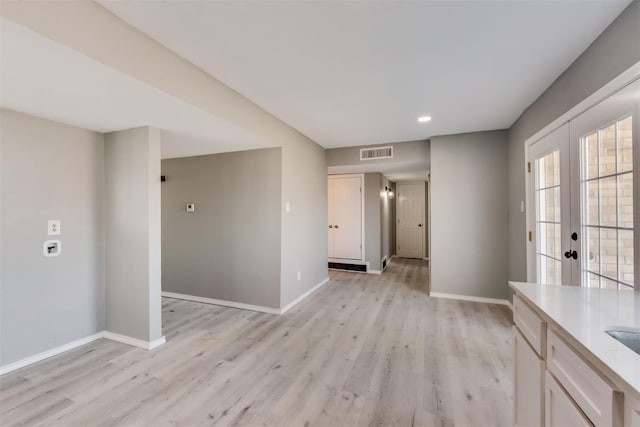 4205 Longstraw Dr, Fort Worth, TX 76137 - unfurnished room featuring light wood-type flooring, french doors, and recessed lighting