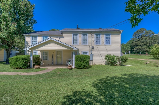 198 Main St, Doyline, LA 71023 - rear view of house with a lawn