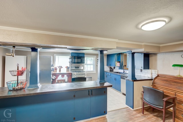 198 Main St, Doyline, LA 71023 - kitchen featuring stainless steel range with gas stovetop, dishwasher, dark countertops, crown molding, and blue cabinets