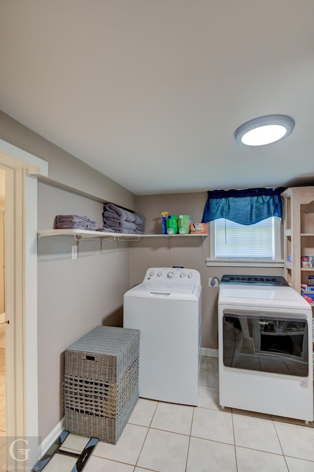 198 Main St, Doyline, LA 71023 - laundry room featuring washing machine and dryer and light tile patterned floors