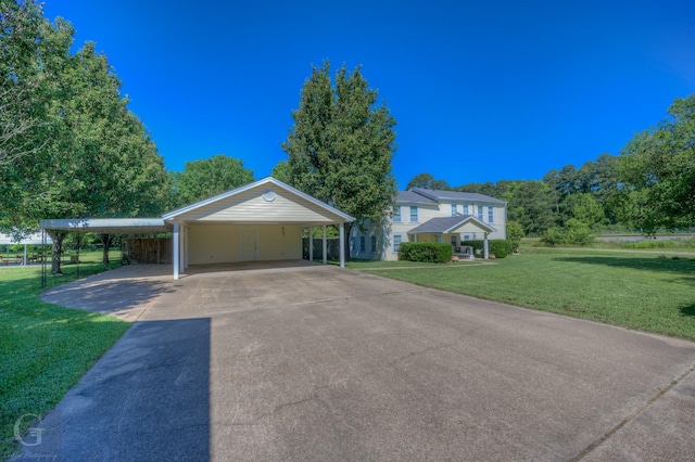198 Main St, Doyline, LA 71023 - view of front of property featuring a front lawn, a carport, and driveway