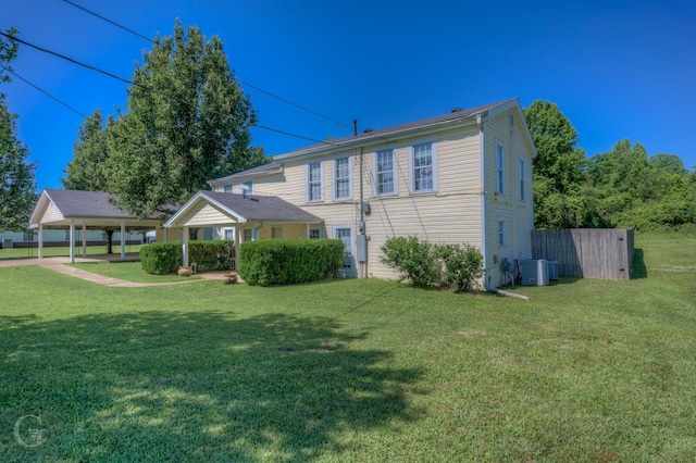 198 Main St, Doyline, LA 71023 - back of property with central AC and a yard