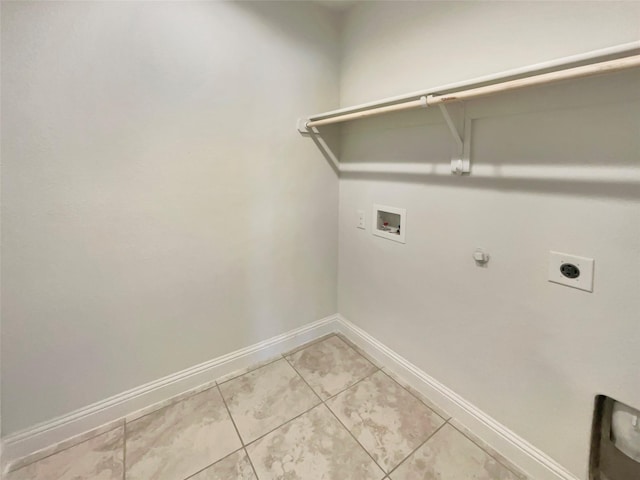 629 Brody Trl, Aledo, TX 76008 - washroom with hookup for an electric dryer, baseboards, washer hookup, light tile patterned floors, and hookup for a gas dryer