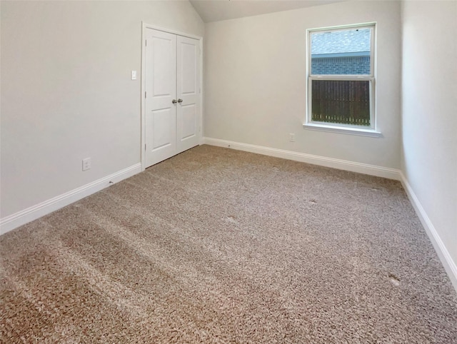 629 Brody Trl, Aledo, TX 76008 - carpeted spare room featuring lofted ceiling and baseboards