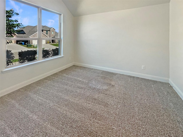 629 Brody Trl, Aledo, TX 76008 - spare room with vaulted ceiling, carpet flooring, and baseboards