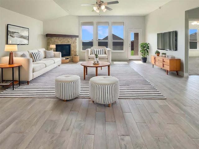 629 Brody Trl, Aledo, TX 76008 - living room featuring ceiling fan, wood finished floors, a fireplace, and vaulted ceiling