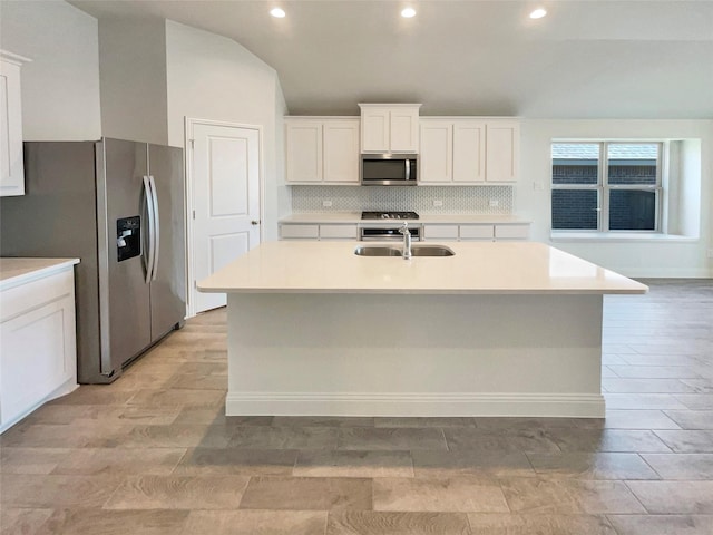 629 Brody Trl, Aledo, TX 76008 - kitchen with appliances with stainless steel finishes, a sink, tasteful backsplash, recessed lighting, and light countertops